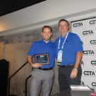 Aaron Auger recognizes Aaron Lindholm as he completes his term on the CETA board.
